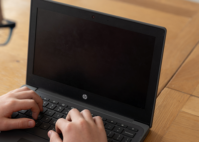Hands on keyboard laptop