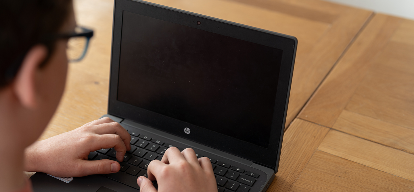 Hands on keyboard laptop